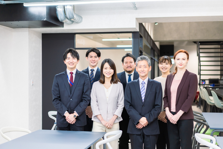 Group photo of smiling business people